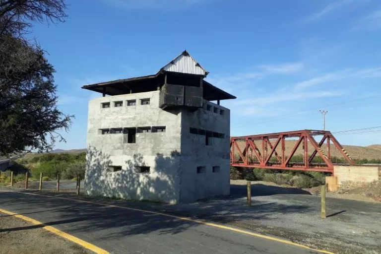 The railway bridge that spans the Geelbek River is guarded by the Anglo-Boer War Blockhouse.